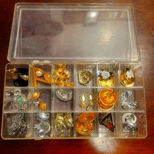 18 pairs of earrings,  posts and clips.